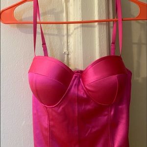 Bright pink body con balcony dress